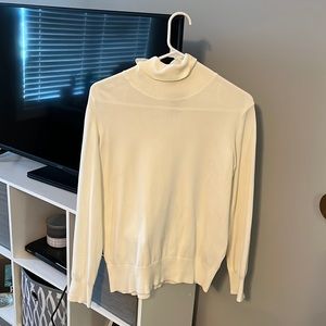 white, turtle neck sweater
